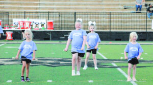 Studio X-Treme twirlers take field before RHS Homecoming game